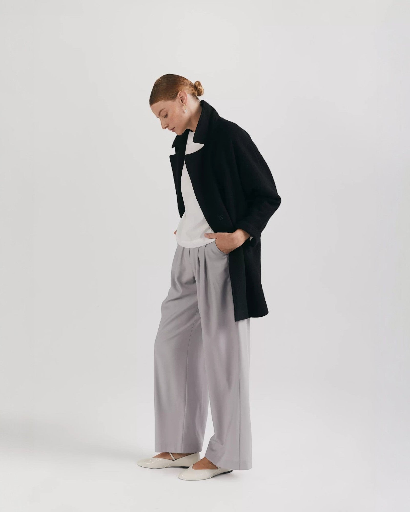 Ipanomi black oversized wool jacket with scarf collar and invisible snap closure. Ideal for layering.
