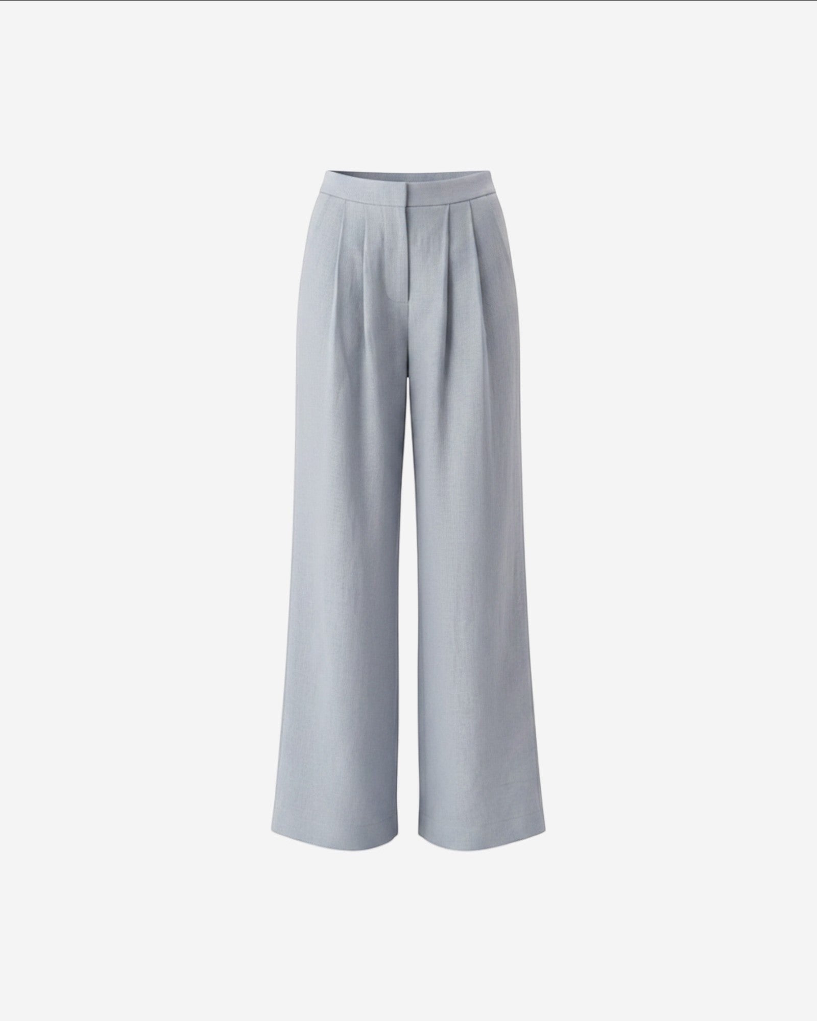 Ipanomi light blue pure linen wide-leg trousers with double pleats and high waist. Model wearing size S.