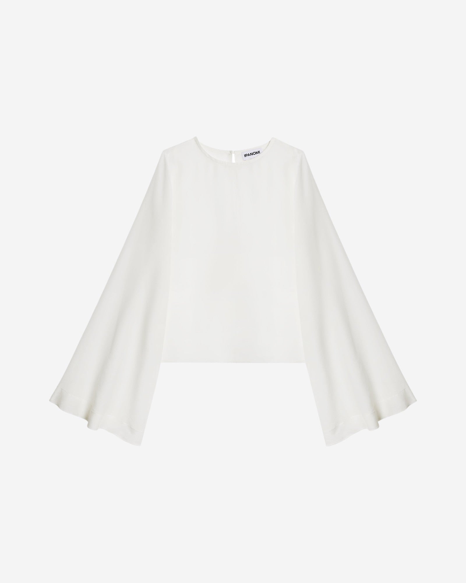 Ipanomi white cotton and silk blend top with elegant bell sleeves and a rounded neckline.