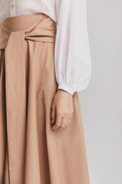 Fustă cloche lungă cu talie înaltă și buzunare bej - ipanomi.com