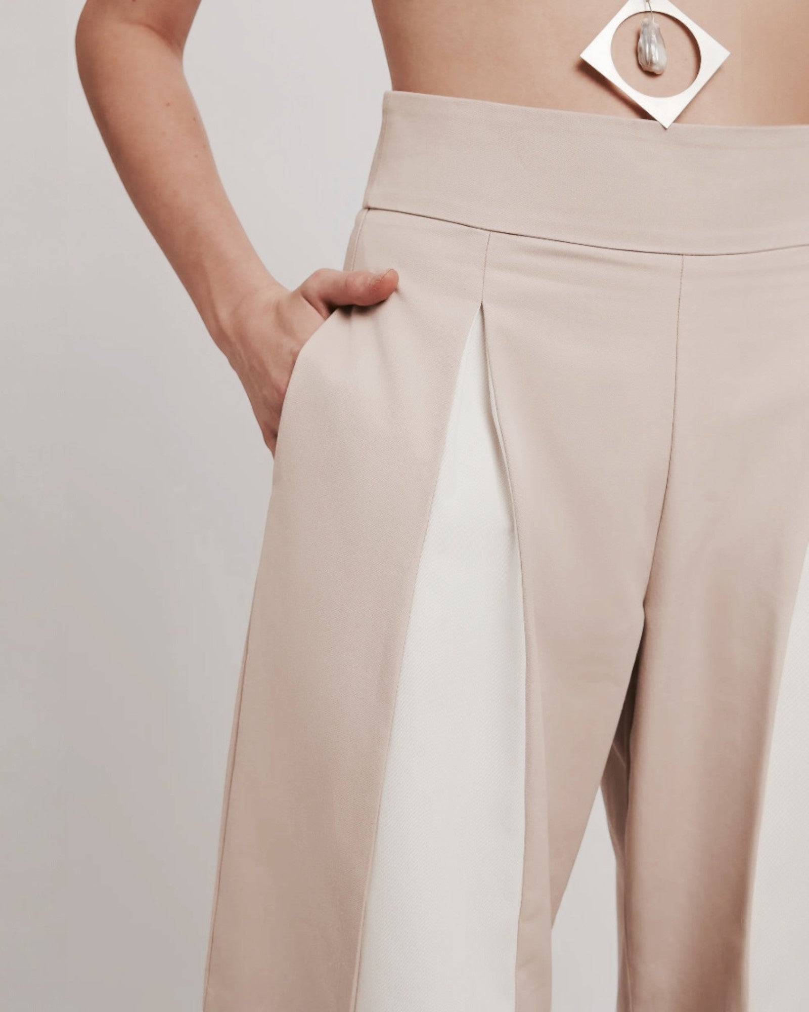 Ipanomi beige cotton twill wide-leg trousers with a high waist and contrasting white panel detail.