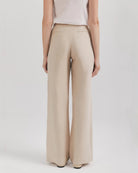 Ipanomi beige wide-leg linen trousers with high waist and side pockets. OEKO-TEX certified.