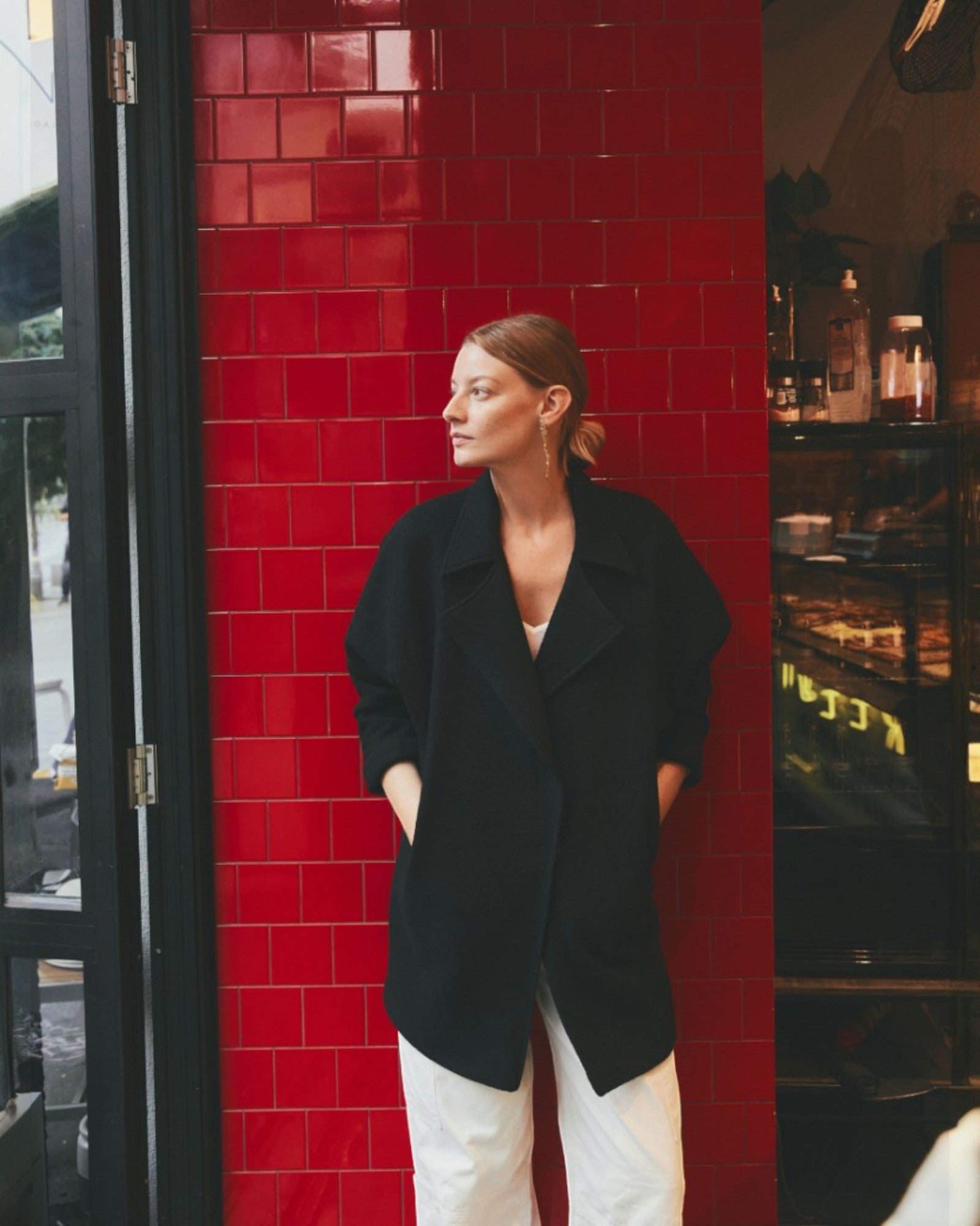 Ipanomi black oversized wool jacket with scarf collar and invisible snap closure, side pockets.