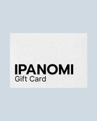 Ipanomi Gift Card with black text on a textured white background. Available in digital format.