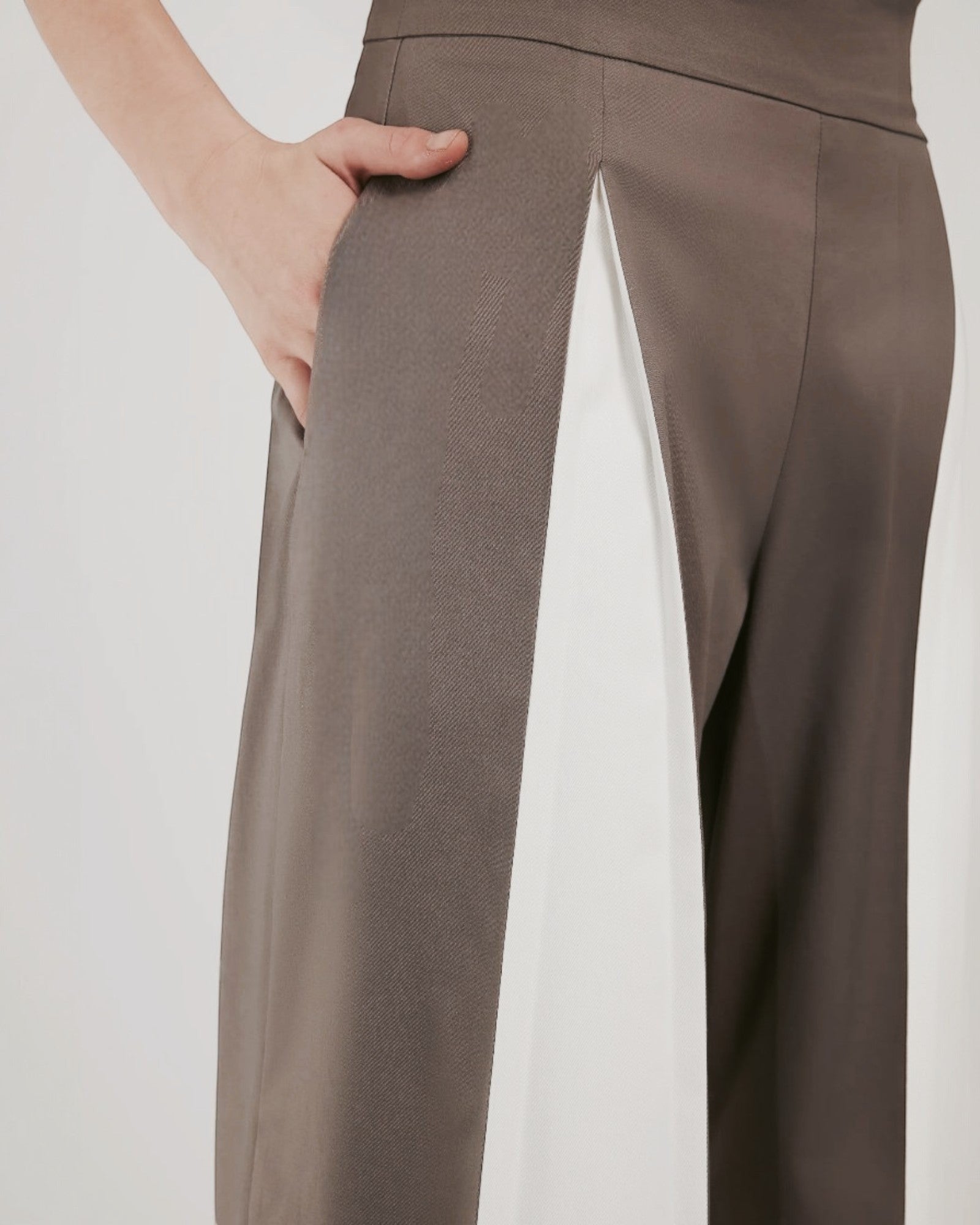 Ipanomi grey cotton twill wide-leg trousers with a contrasting white panel and side slit detail.