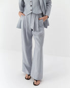 Ipanomi light blue pure linen wide-leg trousers with double pleats and high waist. OEKO-TEX certified.