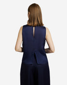 Ipanomi navy blue silk sleeveless top with a relaxed fit and a keyhole back detail.