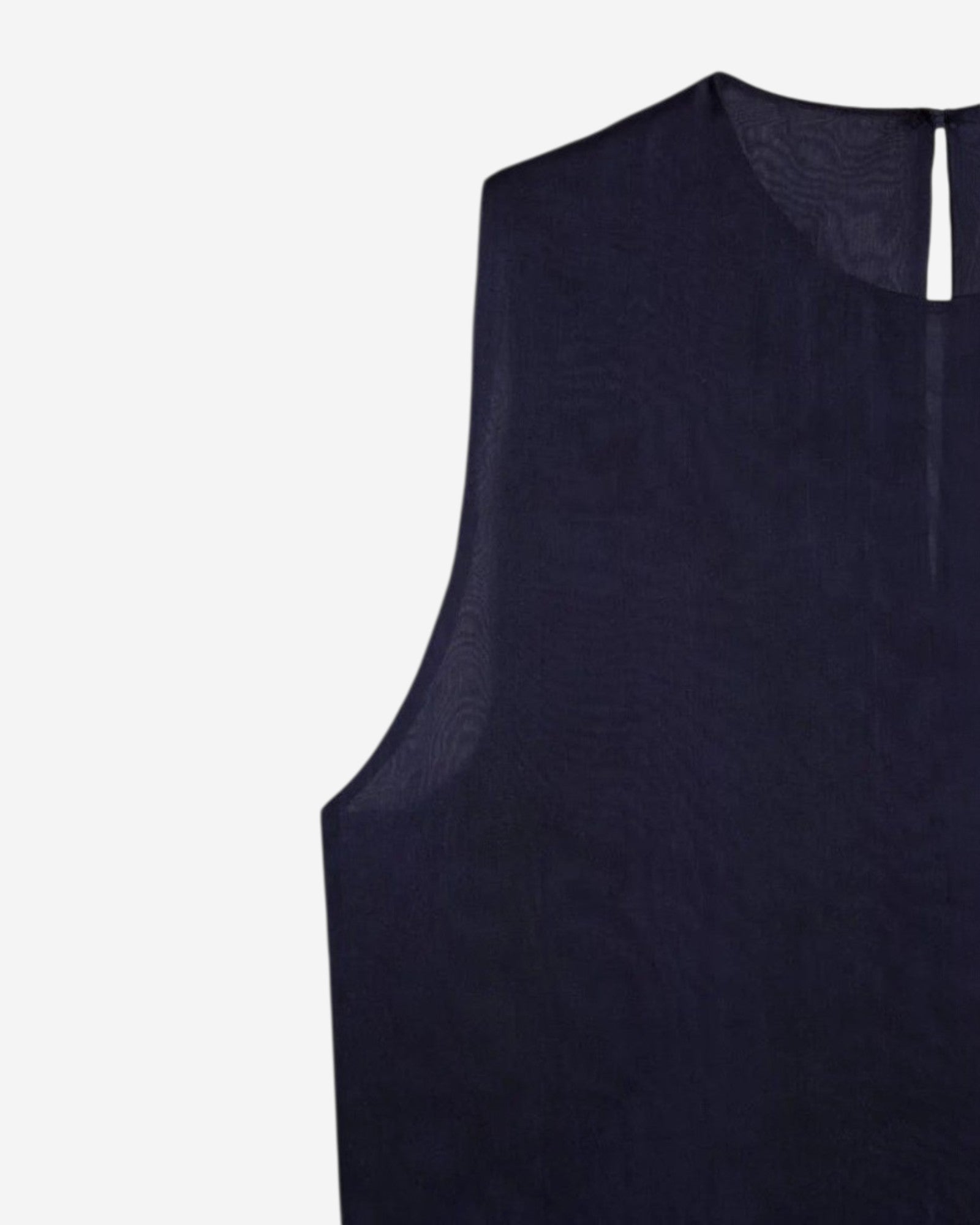 Ipanomi navy blue silk sleeveless top with a round neckline and relaxed fit. Elegant and versatile for office or evening wear.