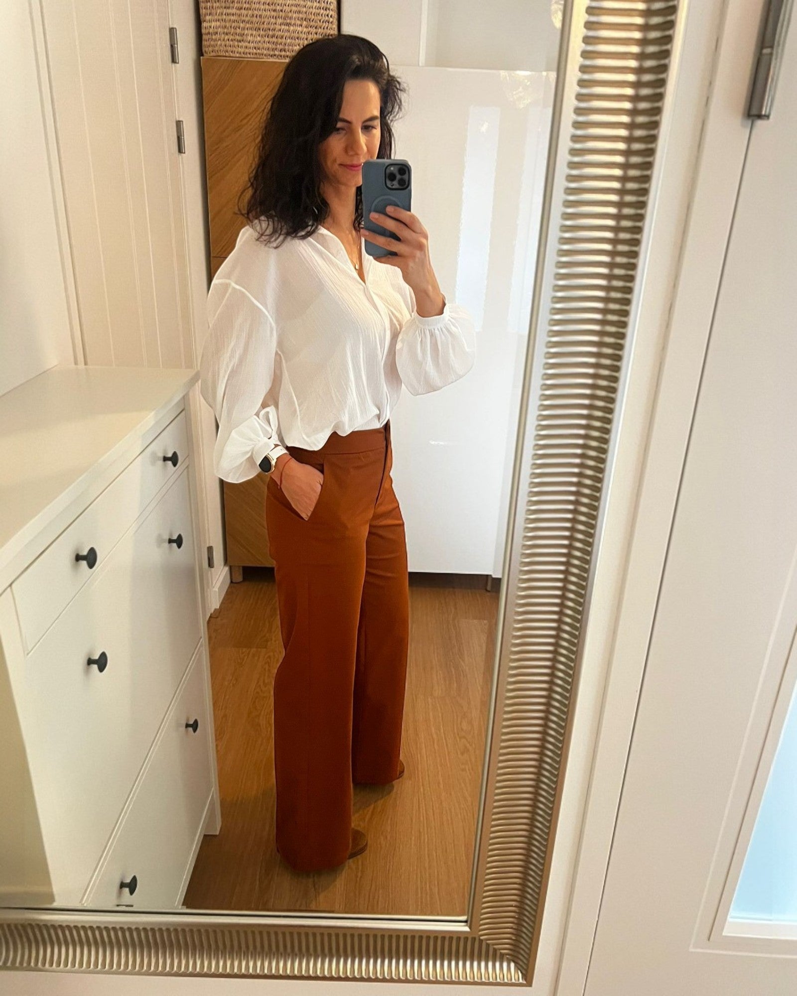 Ipanomi women's terracotta cotton twill wide-leg trousers with a straight cut and defined waist.