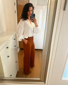 Ipanomi women's terracotta cotton twill wide-leg trousers with a straight cut and defined waist.