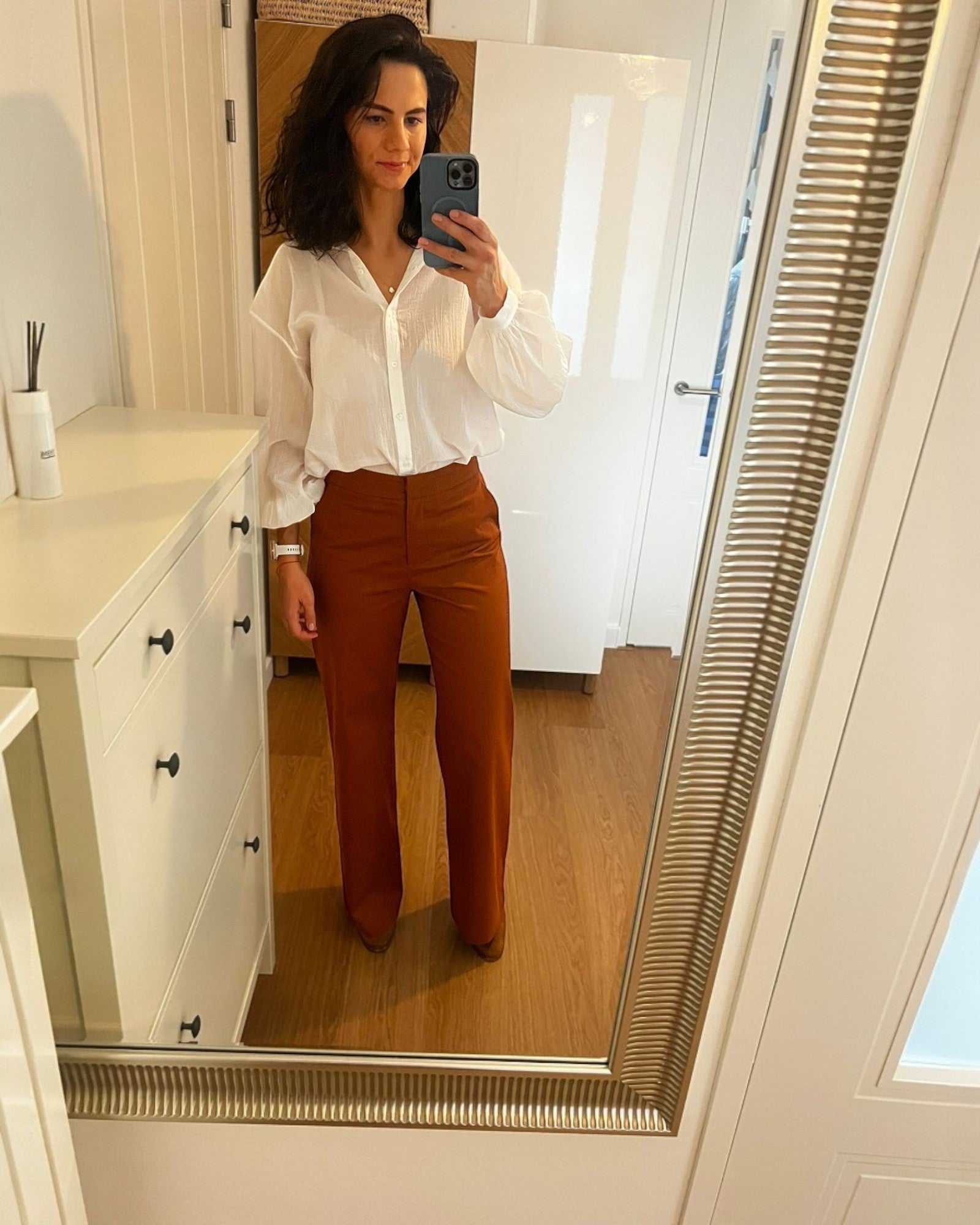 Ipanomi terracotta cotton twill straight-leg trousers with a defined waist and clean lines.