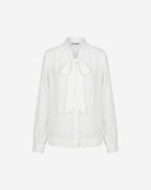 Ipanomi white cotton blouse with a tie neck detail and long sleeves, perfect for office or smart casual wear.