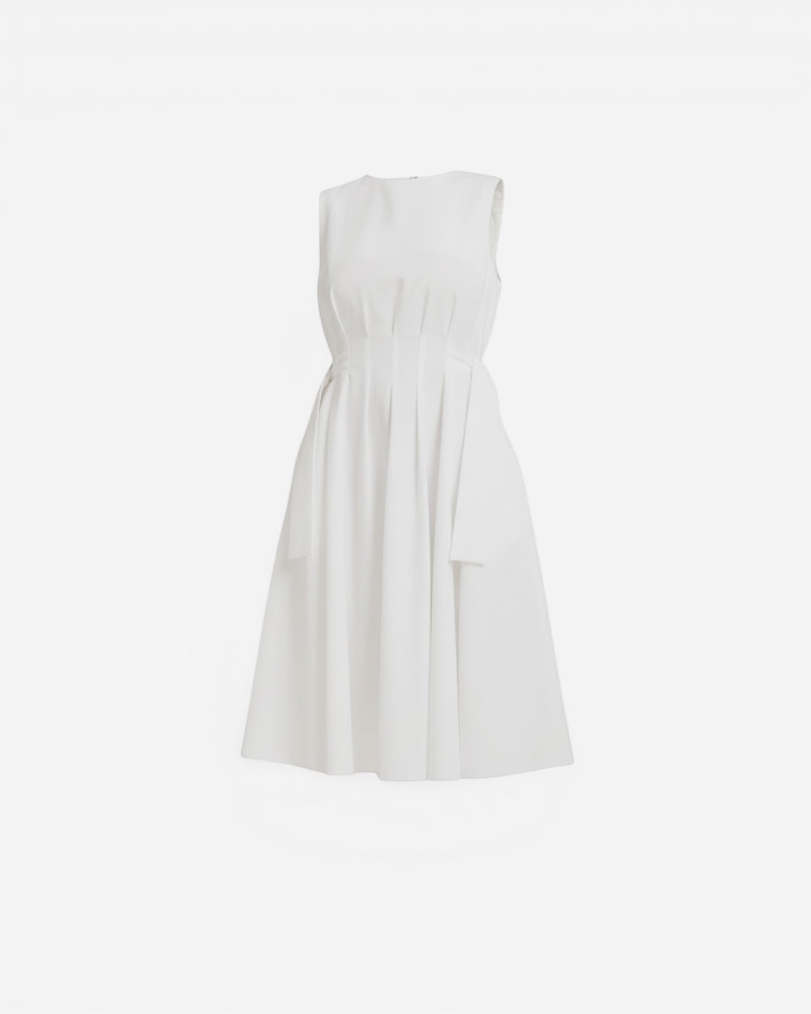 Ipanomi white cotton midi dress with adjustable waist ties, pleats, and hidden pockets. Sleeveless, round neck, back zip.