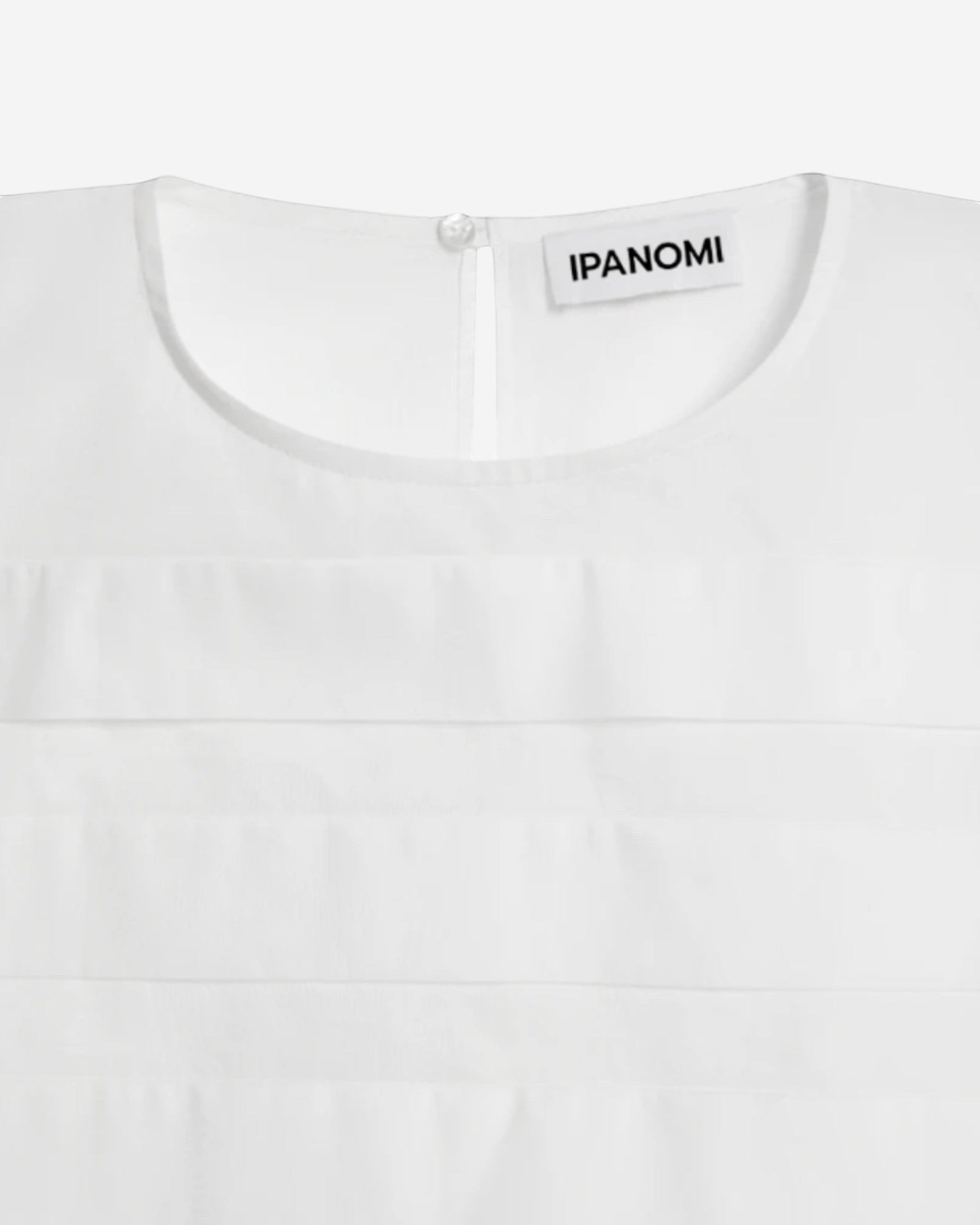 Ipanomi white cotton poplin crop shirt with 3/4 sleeves and delicate pleats.