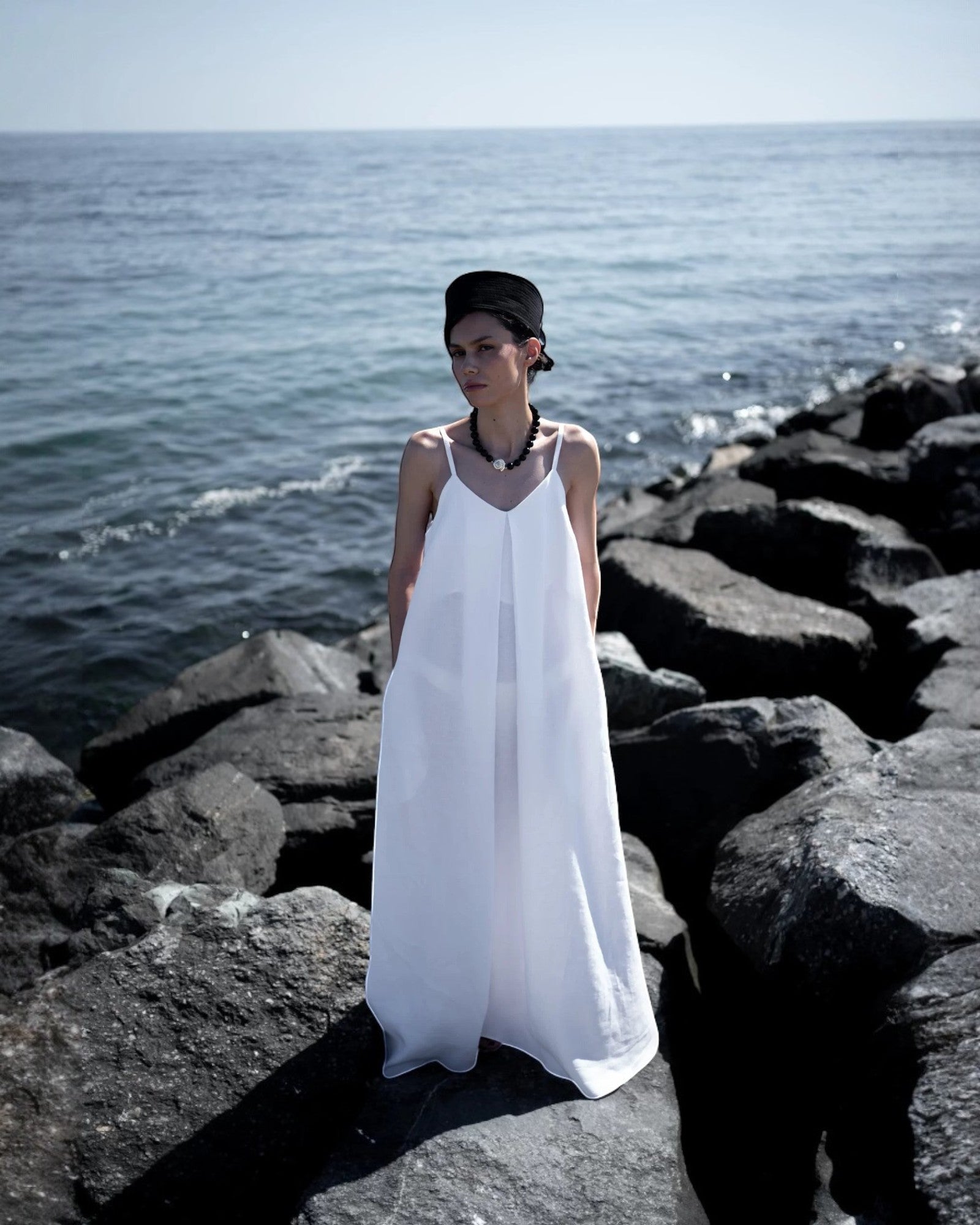 Ipanomi white optic hemp maxi dress with adjustable straps and hidden pockets. Natural, breathable fabric.