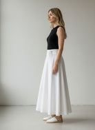Ipanomi white Italian wool midi skirt with high waist and tie detail, A-line silhouette.